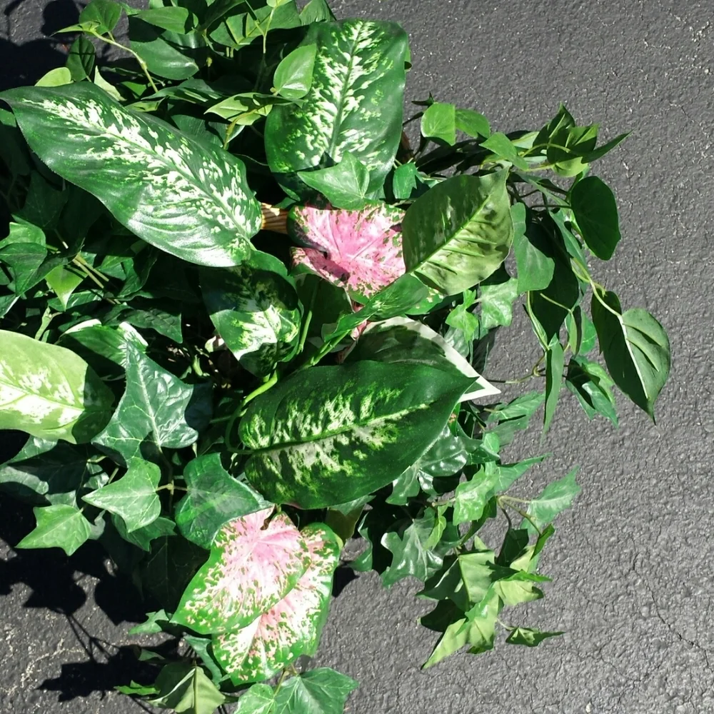 Faux plants in a wicker basket